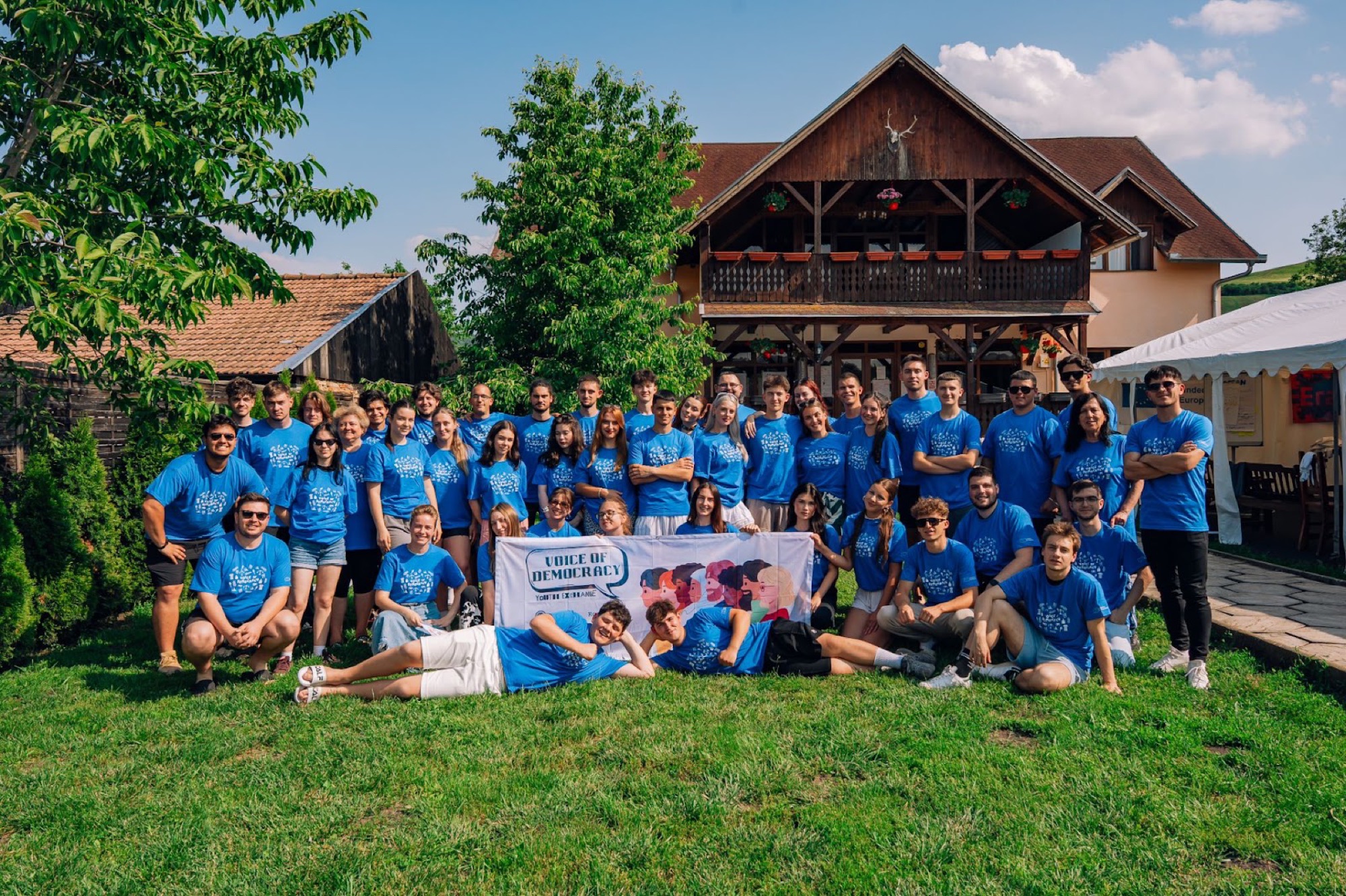 Voice of Democracy participants in matching blue t-shirts
